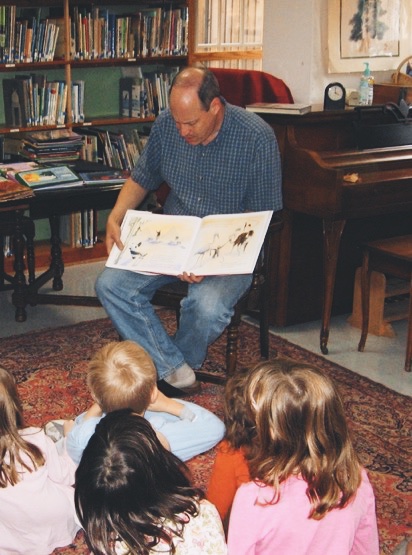 John Snyder Montessori Reading a Book Children