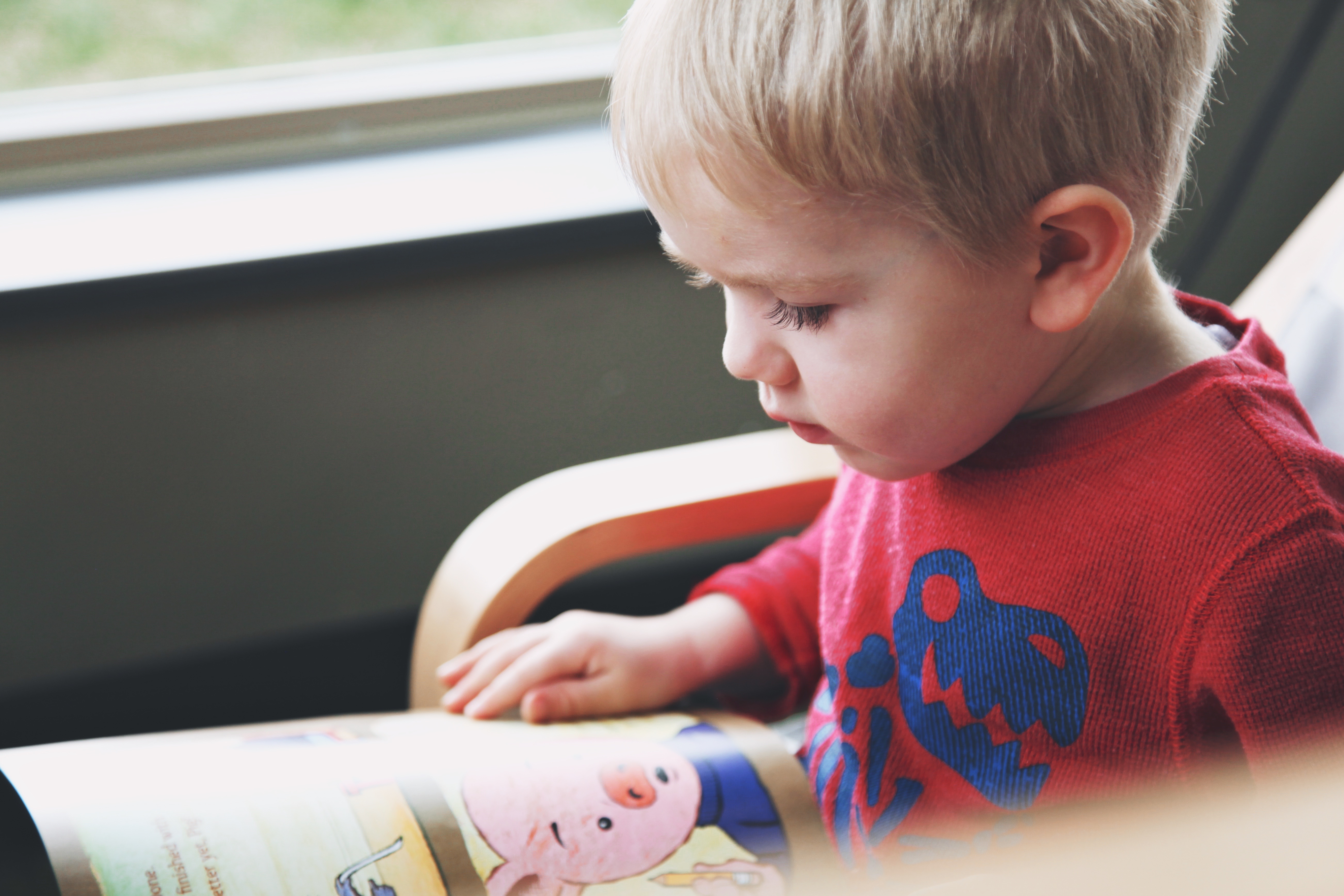 montessori child reading library literacy